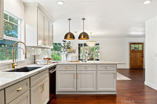 229 S Kingsley Dr, Los Angeles, CA 90004 - kitchen featuring a peninsula, dark wood-style floors, recessed lighting, decorative backsplash, and healthy amount of natural light