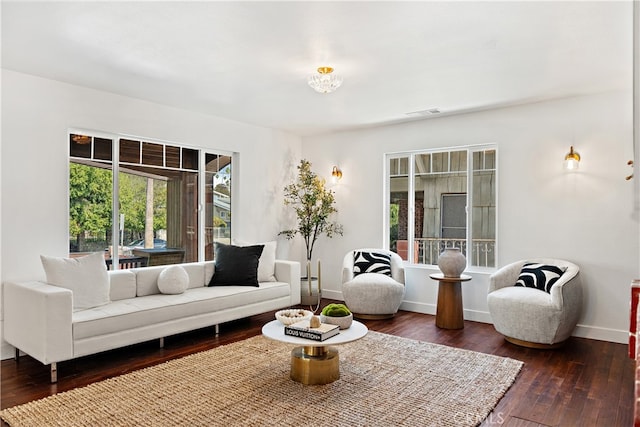 229 S Kingsley Dr, Los Angeles, CA 90004 - living room featuring healthy amount of natural light and dark wood-style floors