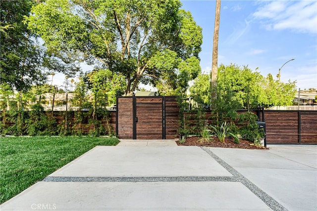 229 S Kingsley Dr, Los Angeles, CA 90004 - view of patio / terrace with a gate
