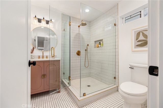 229 S Kingsley Dr, Los Angeles, CA 90004 - bathroom featuring a shower stall, vanity, tile patterned floors, and recessed lighting