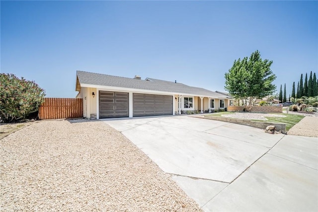 11617 Low Chaparral Dr, Victorville, CA 92392 - ranch-style home featuring an attached garage and concrete driveway