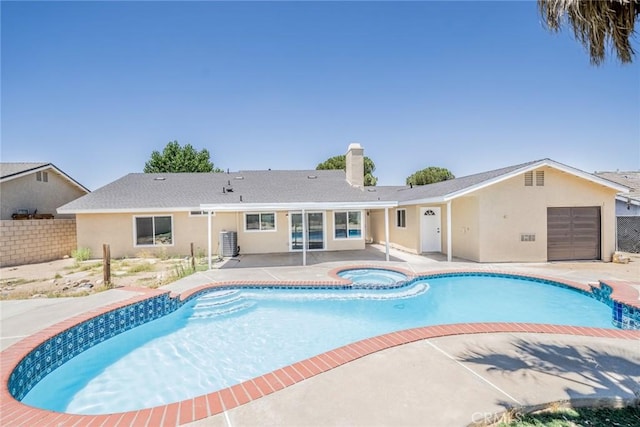 11617 Low Chaparral Dr, Victorville, CA 92392 - view of swimming pool featuring a patio area and a pool with connected hot tub