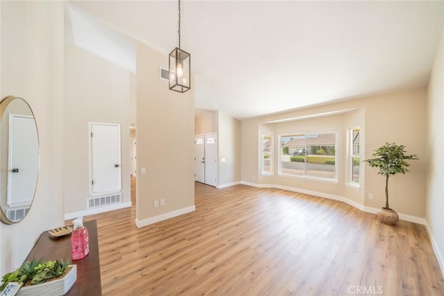 11617 Low Chaparral Dr, Victorville, CA 92392 - unfurnished living room with light wood finished floors
