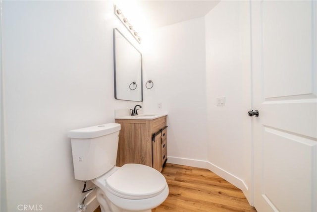11617 Low Chaparral Dr, Victorville, CA 92392 - half bath featuring vanity and wood finished floors