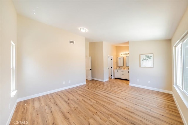 11617 Low Chaparral Dr, Victorville, CA 92392 - empty room featuring light wood-type flooring