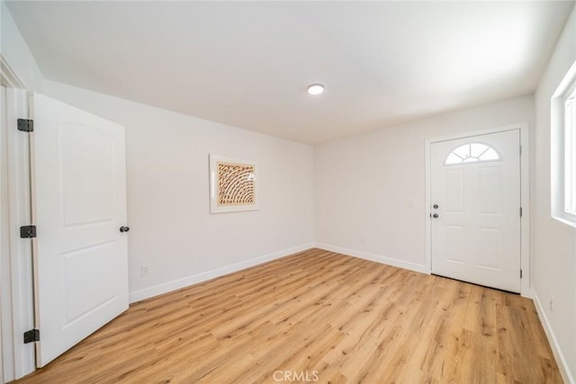 11617 Low Chaparral Dr, Victorville, CA 92392 - entrance foyer featuring light wood finished floors and baseboards