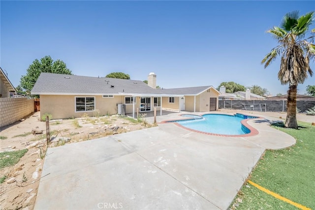11617 Low Chaparral Dr, Victorville, CA 92392 - view of pool featuring a fenced backyard, a patio area, and a pool with connected hot tub