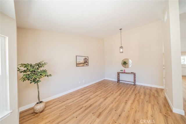 11617 Low Chaparral Dr, Victorville, CA 92392 - unfurnished room with light wood finished floors and baseboards