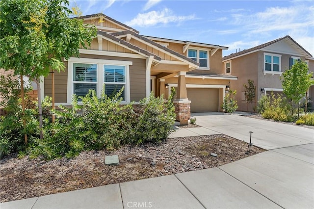 835 Orangedale Ave, Redlands, CA 92374 - view of front facade featuring driveway, a garage, and board and batten siding