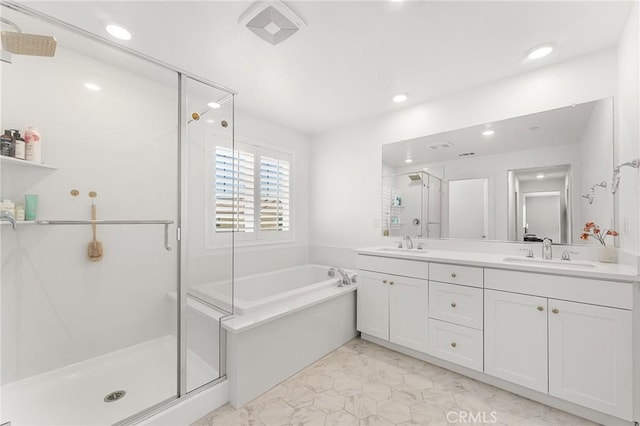 835 Orangedale Ave, Redlands, CA 92374 - full bath featuring a stall shower, a garden tub, double vanity, marble finish floors, and recessed lighting