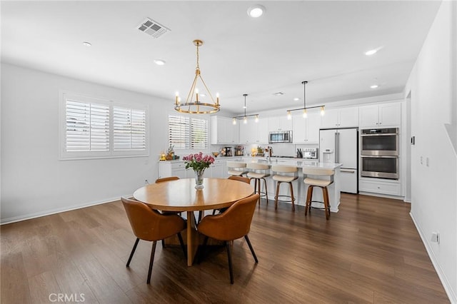 835 Orangedale Ave, Redlands, CA 92374 - dining room with a chandelier, recessed lighting, and dark wood-style floors