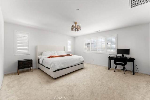 835 Orangedale Ave, Redlands, CA 92374 - carpeted bedroom with a chandelier and a desk