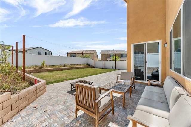 835 Orangedale Ave, Redlands, CA 92374 - fenced backyard featuring a patio and an outdoor living space with a fire pit