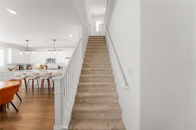 835 Orangedale Ave, Redlands, CA 92374 - stairway with plenty of natural light, wood finished floors, and recessed lighting