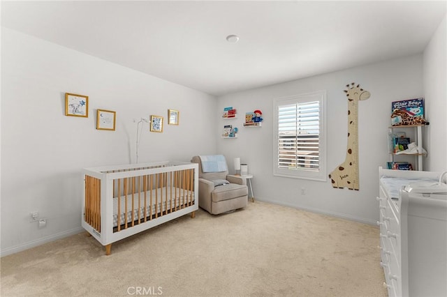 835 Orangedale Ave, Redlands, CA 92374 - bedroom with light carpet and a nursery area