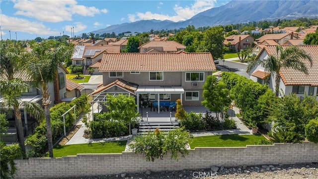 5999 Cedar Mountain Dr, Rancho Cucamonga, CA 91737 - view of front facade with a residential view, stucco siding, a mountain view, and a tiled roof