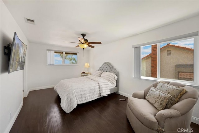 5999 Cedar Mountain Dr, Rancho Cucamonga, CA 91737 - bedroom featuring dark wood-style floors and a ceiling fan