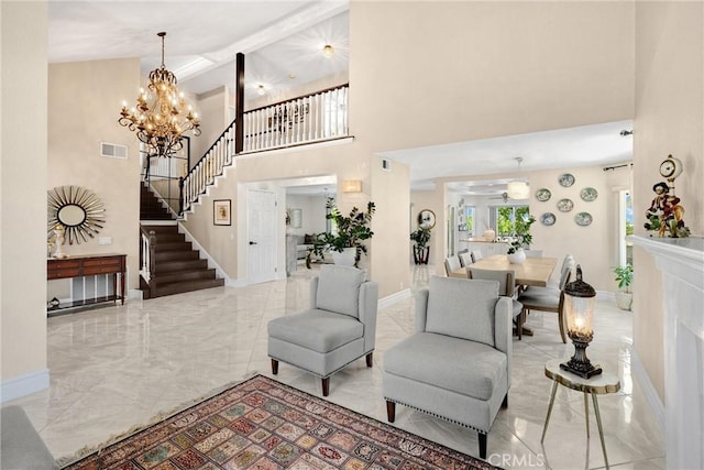 5999 Cedar Mountain Dr, Rancho Cucamonga, CA 91737 - living room with stairway, marble finish floors, a towering ceiling, and a chandelier