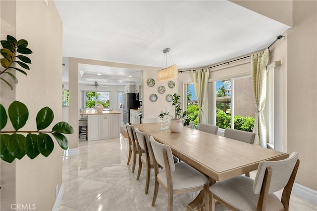 5999 Cedar Mountain Dr, Rancho Cucamonga, CA 91737 - dining area with healthy amount of natural light and light marble finish flooring