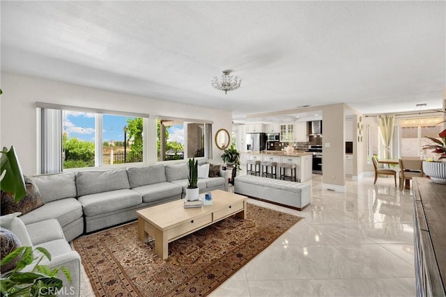 5999 Cedar Mountain Dr, Rancho Cucamonga, CA 91737 - living room with light marble finish flooring and baseboards