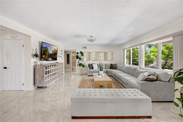 5999 Cedar Mountain Dr, Rancho Cucamonga, CA 91737 - living area featuring light marble finish floors and baseboards
