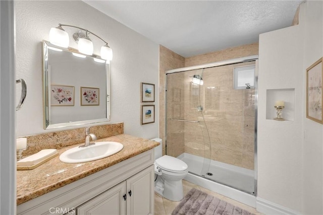 5999 Cedar Mountain Dr, Rancho Cucamonga, CA 91737 - bathroom featuring vanity, a stall shower, and tile patterned flooring