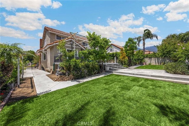 5999 Cedar Mountain Dr, Rancho Cucamonga, CA 91737 - rear view of house featuring stucco siding