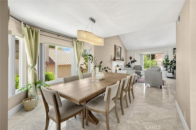 5999 Cedar Mountain Dr, Rancho Cucamonga, CA 91737 - dining space with light marble finish floors and vaulted ceiling