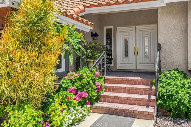 5999 Cedar Mountain Dr, Rancho Cucamonga, CA 91737 - doorway to property with stucco siding and a tiled roof