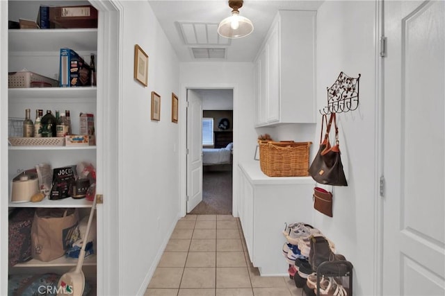 7330 Smoke Tree Rd, Phelan, CA 92371 - hallway with light tile patterned floors and baseboards