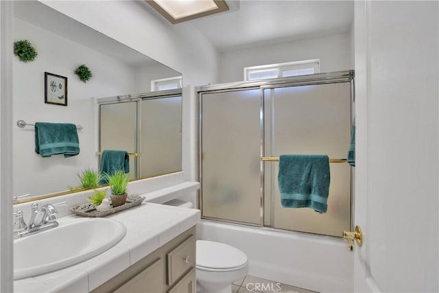 7330 Smoke Tree Rd, Phelan, CA 92371 - bathroom with vanity, enclosed tub / shower combo, and tile patterned floors