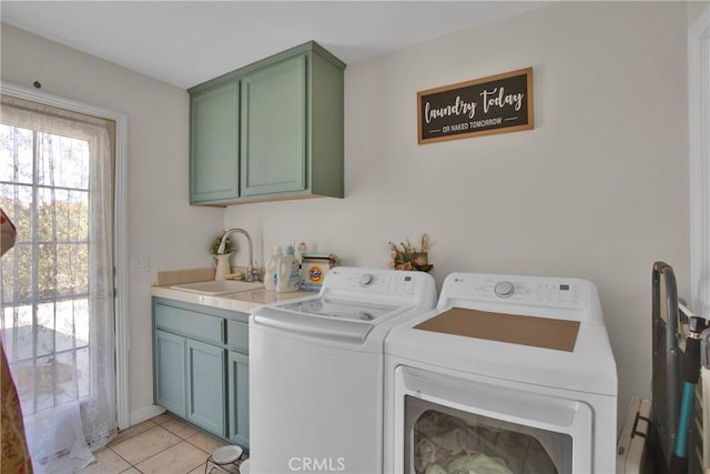 7330 Smoke Tree Rd, Phelan, CA 92371 - laundry area with cabinet space, washing machine and dryer, and light tile patterned floors