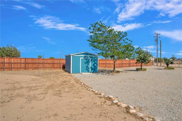 7330 Smoke Tree Rd, Phelan, CA 92371 - fenced backyard featuring a storage shed