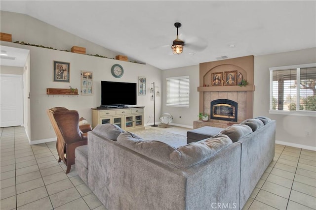 7330 Smoke Tree Rd, Phelan, CA 92371 - living area featuring light tile patterned flooring, ceiling fan, lofted ceiling, and plenty of natural light