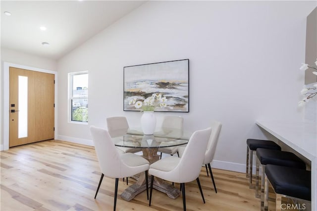 17905 Bullock St, Encino, CA 91316 - dining space featuring light wood-type flooring, lofted ceiling, and recessed lighting