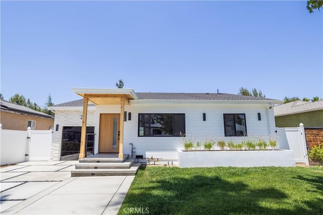 17905 Bullock St, Encino, CA 91316 - view of front facade featuring a gate