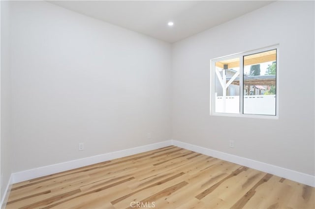 17905 Bullock St, Encino, CA 91316 - unfurnished room featuring wood finished floors and recessed lighting