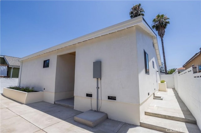 17905 Bullock St, Encino, CA 91316 - rear view of property featuring a patio and stucco siding