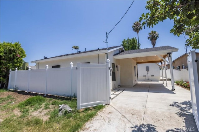 17905 Bullock St, Encino, CA 91316 - rear view of house featuring stucco siding
