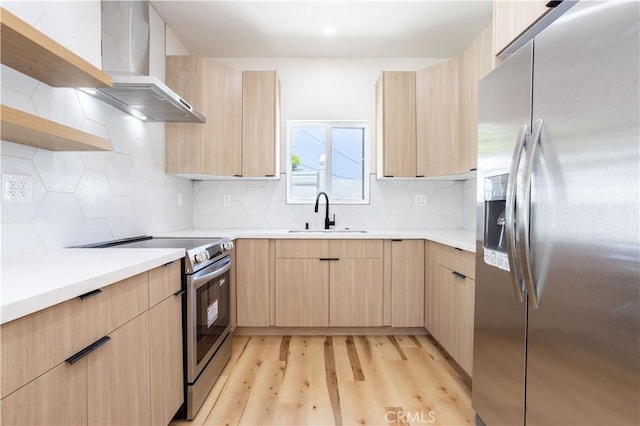 17905 Bullock St, Encino, CA 91316 - kitchen with appliances with stainless steel finishes, wall chimney exhaust hood, light brown cabinets, and open shelves