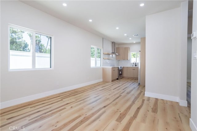 17905 Bullock St, Encino, CA 91316 - unfurnished living room featuring recessed lighting and light wood finished floors