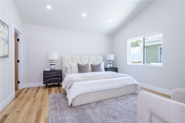 17905 Bullock St, Encino, CA 91316 - bedroom featuring light wood-style flooring, lofted ceiling, and recessed lighting
