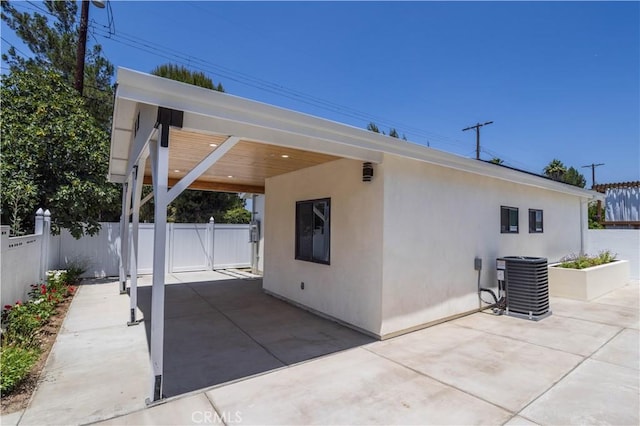 17905 Bullock St, Encino, CA 91316 - view of patio featuring a carport