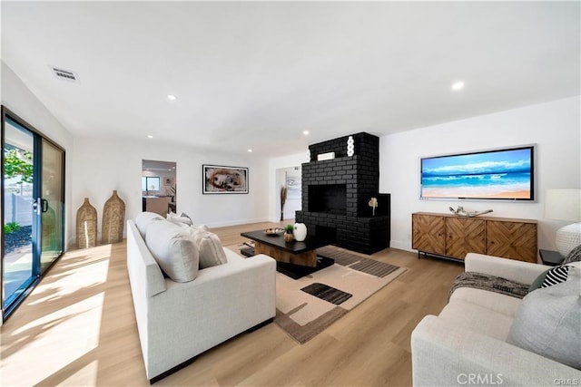 1603 Sunnyside, San Pedro, CA 90732 - living room with light wood-style floors, a fireplace, and recessed lighting