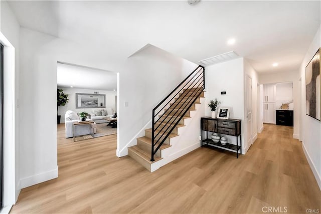 1603 Sunnyside, San Pedro, CA 90732 - foyer entrance with light wood-style floors, stairway, and recessed lighting