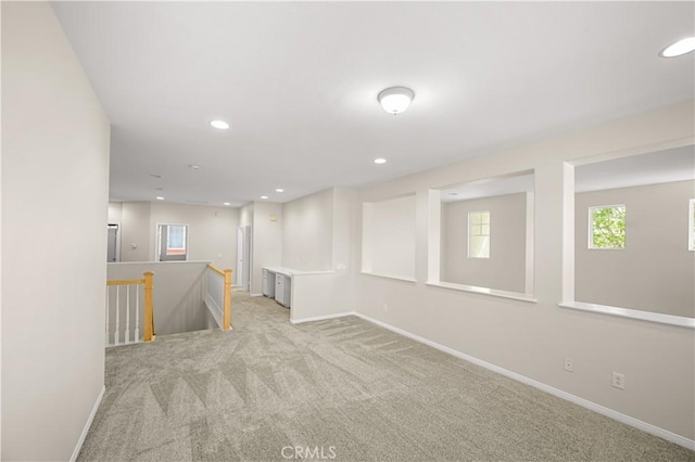 36845 Gemina Ave, Murrieta, CA 92563 - below grade area with light colored carpet, plenty of natural light, and recessed lighting