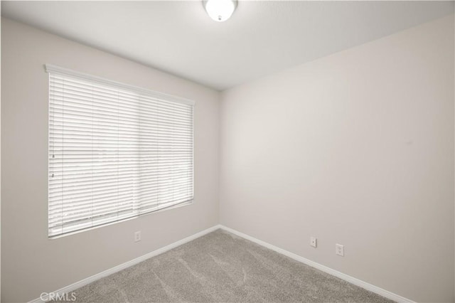 36845 Gemina Ave, Murrieta, CA 92563 - carpeted spare room with baseboards