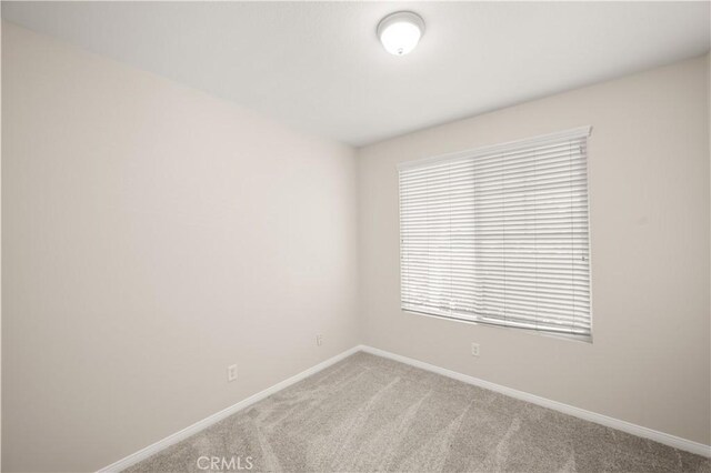 36845 Gemina Ave, Murrieta, CA 92563 - carpeted empty room with baseboards