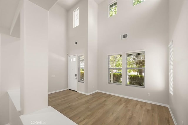 36845 Gemina Ave, Murrieta, CA 92563 - foyer entrance with wood finished floors and a towering ceiling