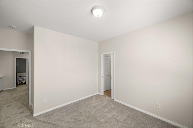 36845 Gemina Ave, Murrieta, CA 92563 - spare room featuring light carpet and baseboards